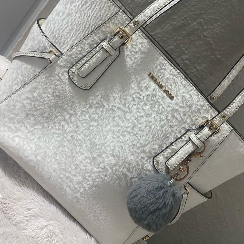 White and gold Micheal kors purse
